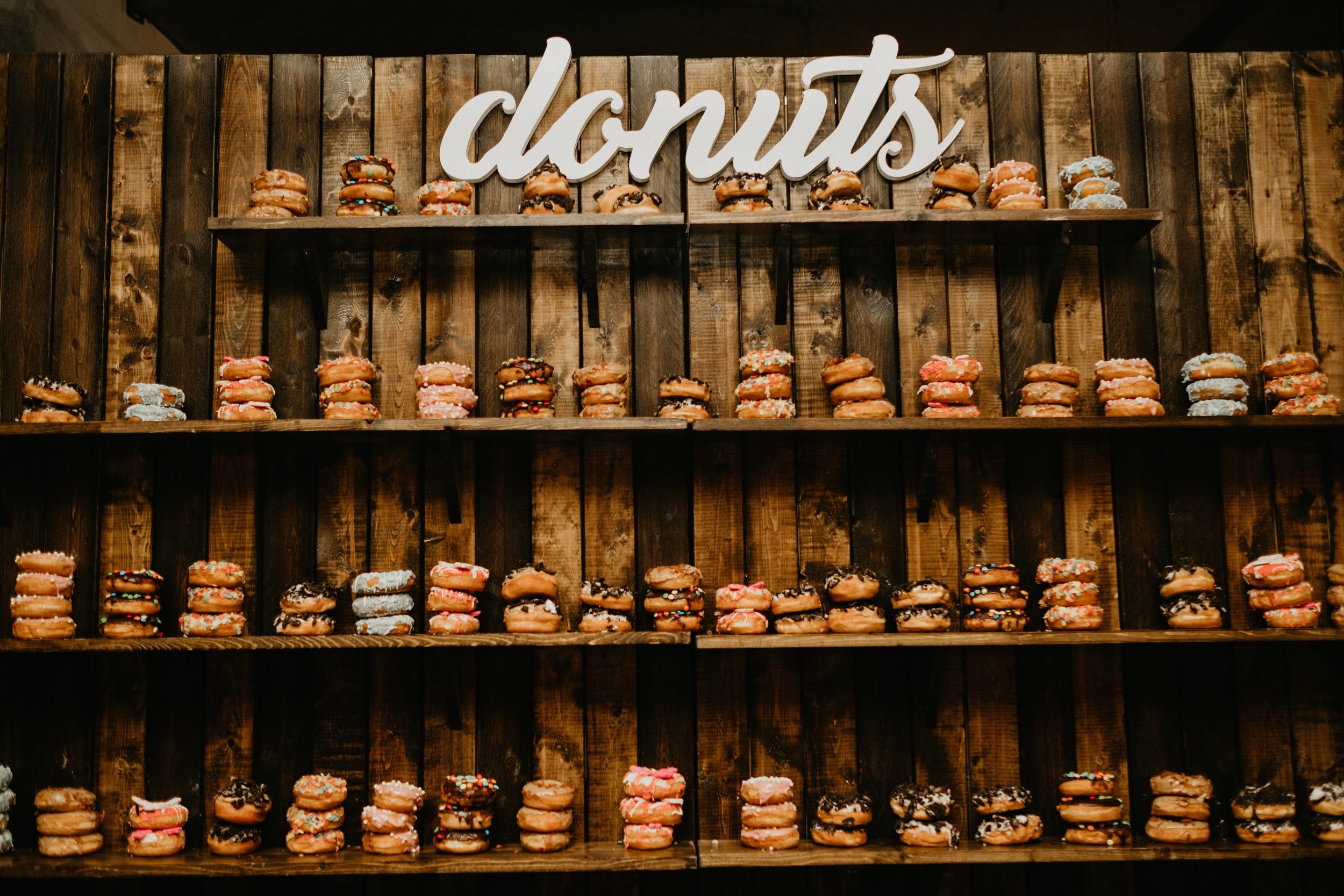 Our team created an art installation of love and sugar with the delicious confections from the Donut Bar.