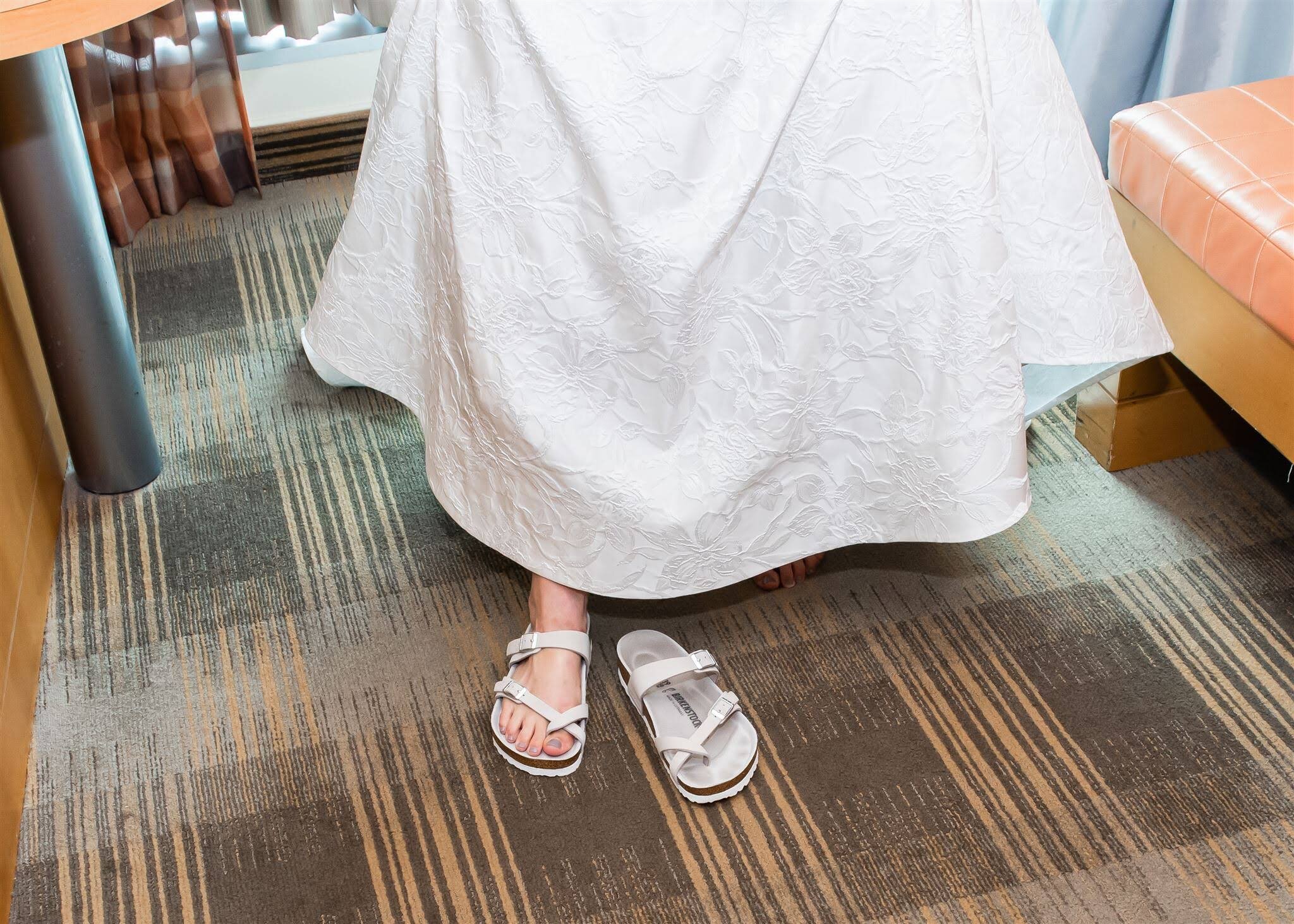 Julie kept her feet cool, stylish and comfy all day in her white Birkenstock sandals.